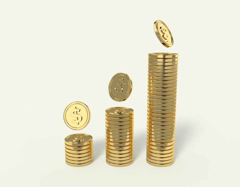 Des pièces de monnaie empilées montrant une croissance en hauteur.